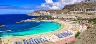 Best beaches of Gran Canaria - Playa de los amadores. Canary island,Spain. clipart