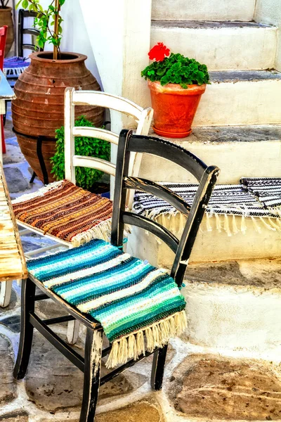 Traditional Greece. Typical street taverns (bars) of Greece. Naxos island, Cyclades.