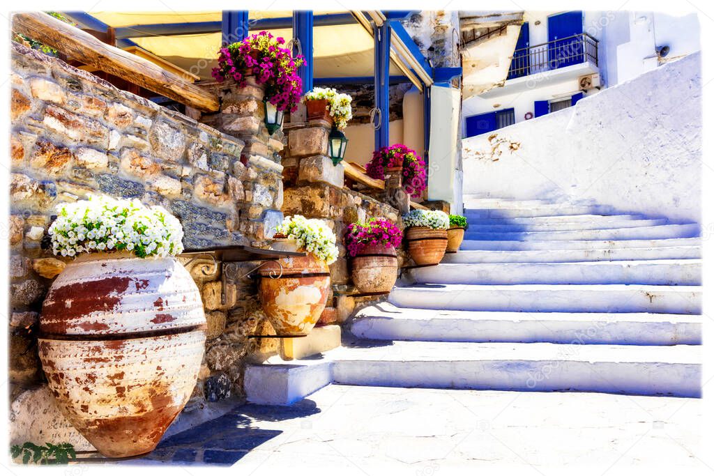 Traditional Greece. Charming floral narrow strees of  Naxos island, Cycades.