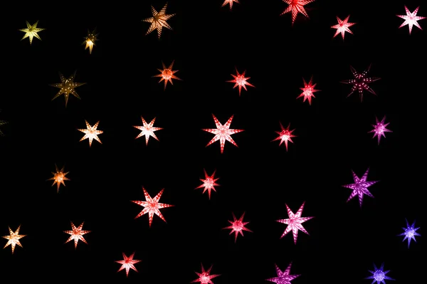 Estrellas de Navidad sobre un fondo oscuro — Foto de Stock