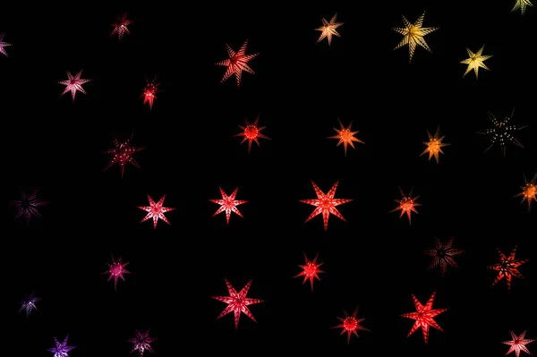 Різдвяні зірки на темному фоні — стокове фото
