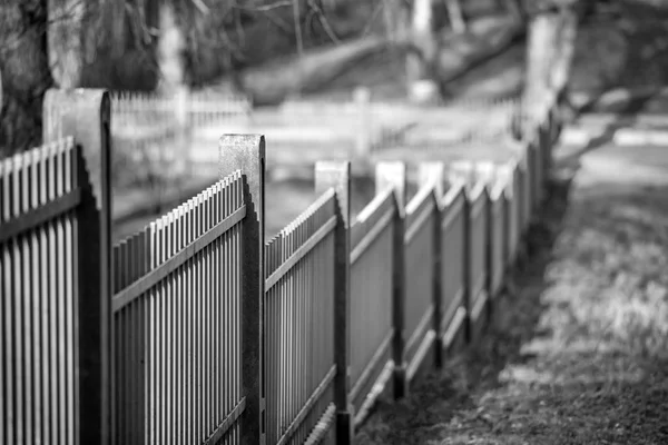 Metal fence on the hill — Stock Photo, Image