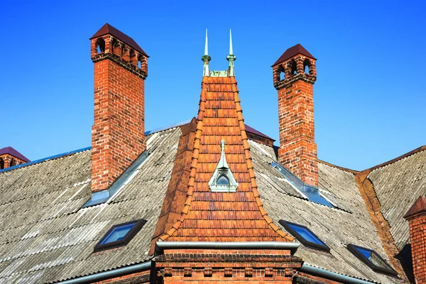 Old red brick house in the English Gothic revival style