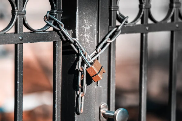 Gate to the lock with a chain