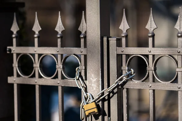 Gate to the lock with a chain