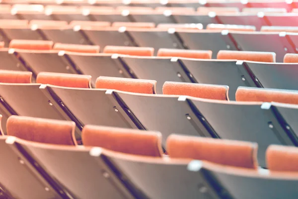 Seats for spectators at a sports ground