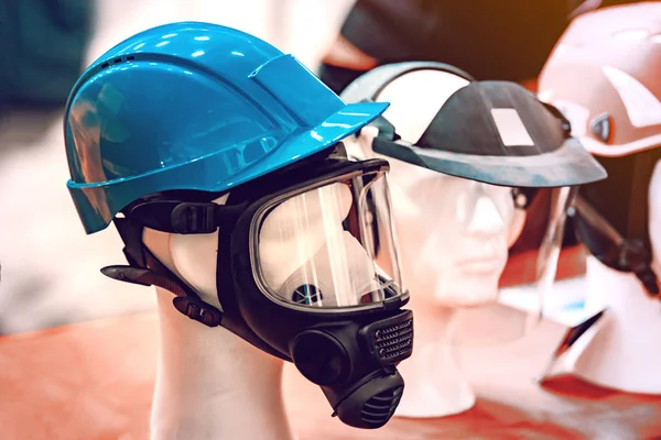 Protective helmets on mannequins