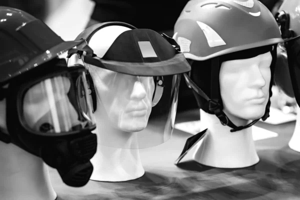 Protective helmets on mannequins — Stock Photo, Image