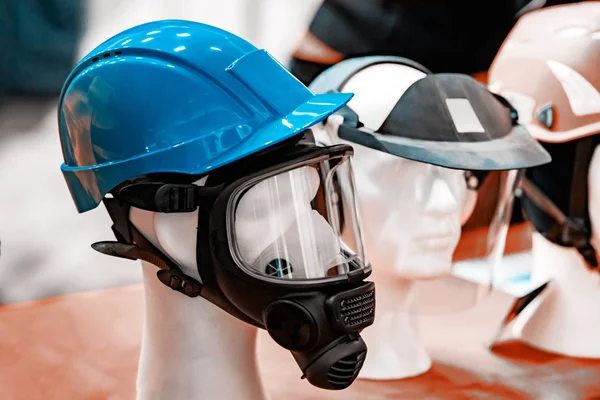 Protective helmets on mannequins