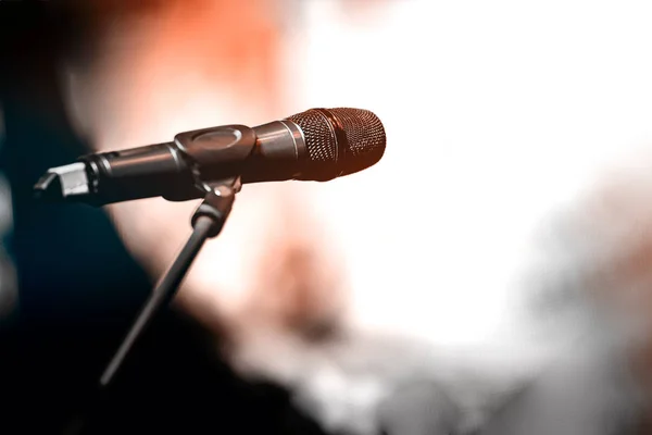 Dark microphone on stand — Stock Photo, Image