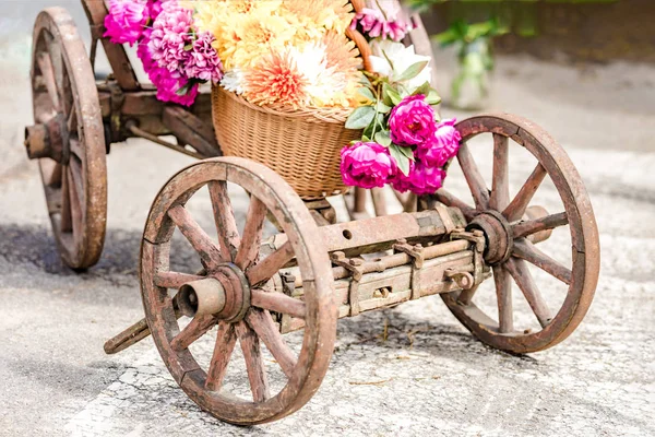 Wooden cart with flowers