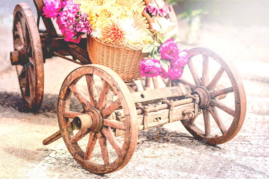 Wooden cart with flowers