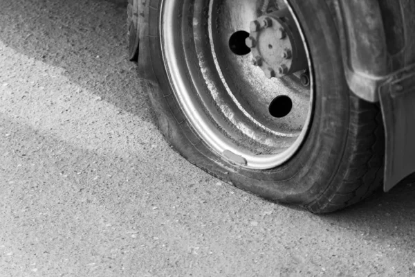 A flat tire of car