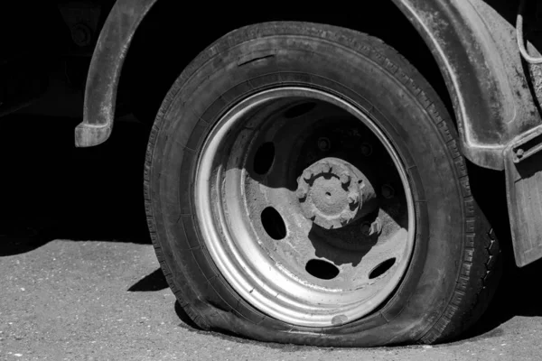 A flat tire of car
