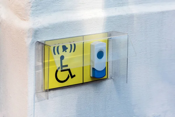 Disabled sign with signal button
