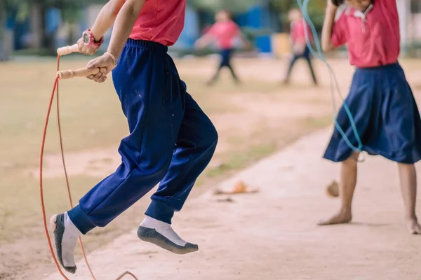 Images of indian kid doing skipping rope Stock Photos, Royalty Free ...
