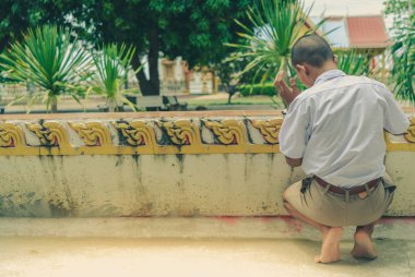 Öğrenciler Tay motifleri tapınağın Tay mimari çizim için deneyin.