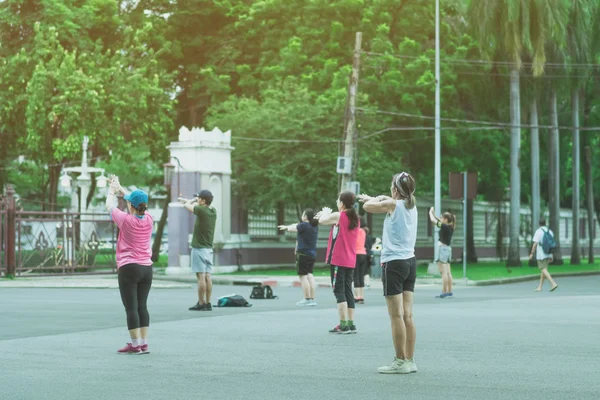 Group of elderly friend doing aerobic dance after work   together