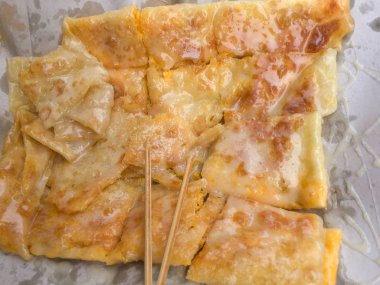 Roti Gluay-hawm (Muz), Tayland 'da sokak yemeklerinde geleneksel Hint sokak yemekleri..