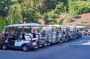 Golf arabaları Konuk için bir satır yazın Hamilton adada Whitsundays, Avustralya