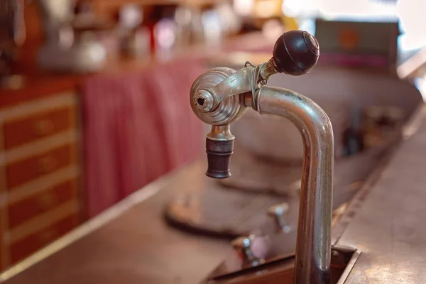 Old fashioned soda fountain on the counter of a retro cafe