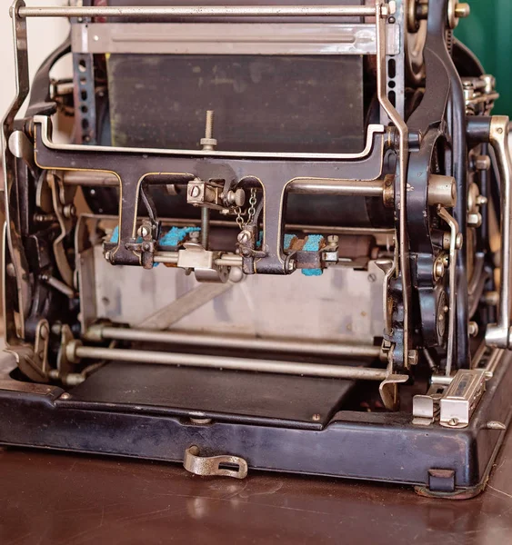 Close up of a vintage printing machine