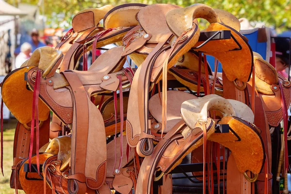 Group Of Leather Saddles At A Market Stall — Stock Photo, Image