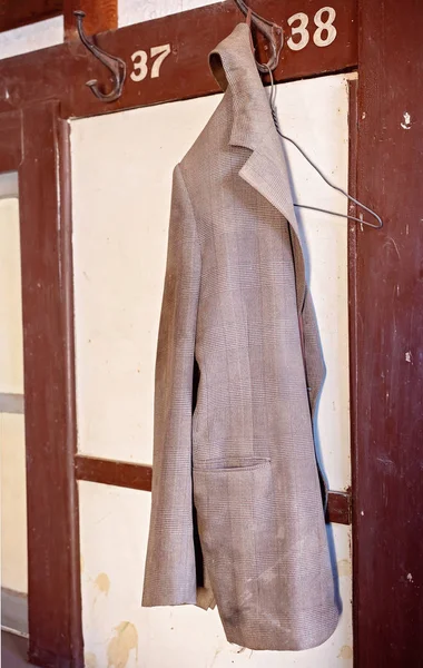 An Old Gold Miners Coat On A Hook