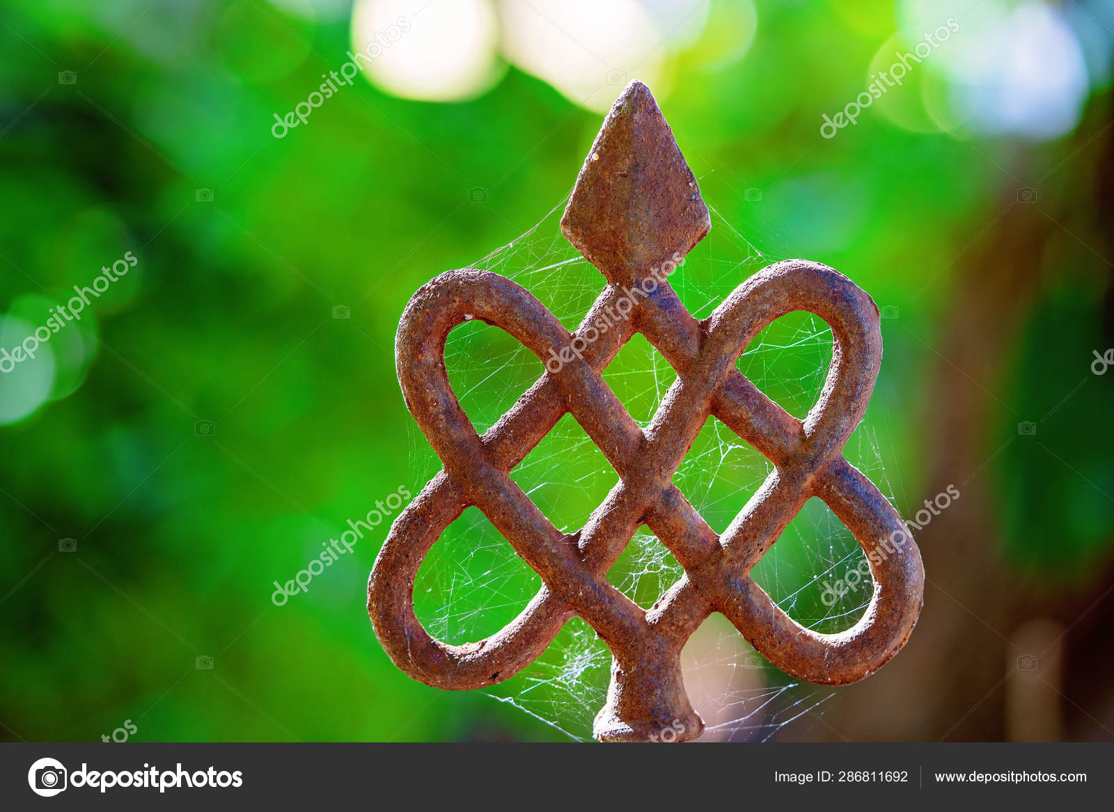 Old Rusty Wrought Iron Fence Decoration Stock Photo
