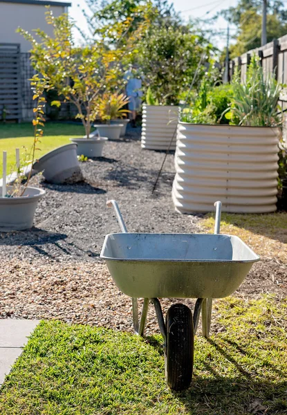 Wheelbarrow And Raised Garden Beds In A Backyard — Stock Photo, Image