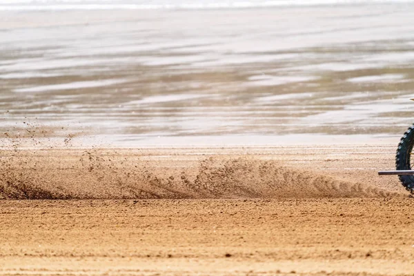Blurred Sand From A Racing Motorbike — Stock Photo, Image
