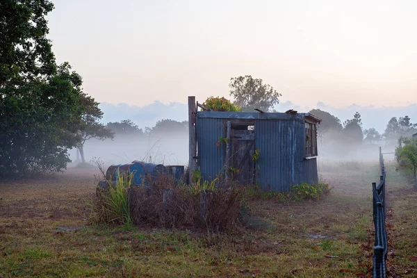 A Old Dilapidated Country Hut On A Foggy Morning — Stok Foto