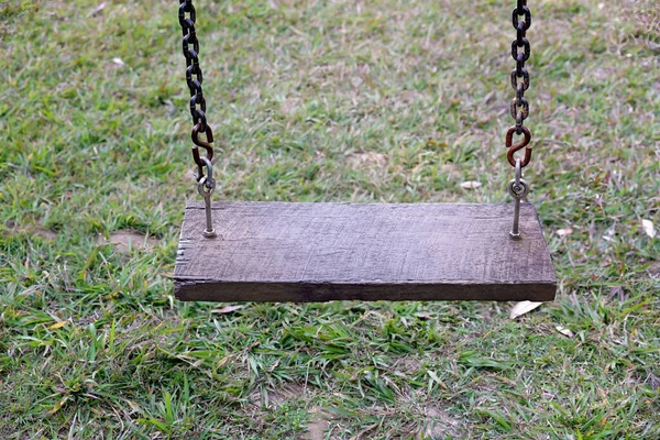 Close Child Swing Wooden Seat Chain — стоковое фото