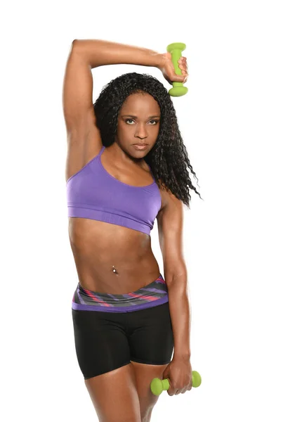 Joven mujer negra haciendo ejercicio — Foto de Stock