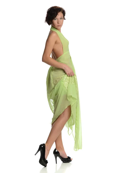 Young woman wearing a green dress — Stock Photo, Image