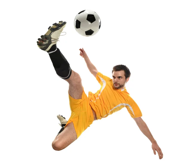 Fußballer kickt den Ball — Stockfoto