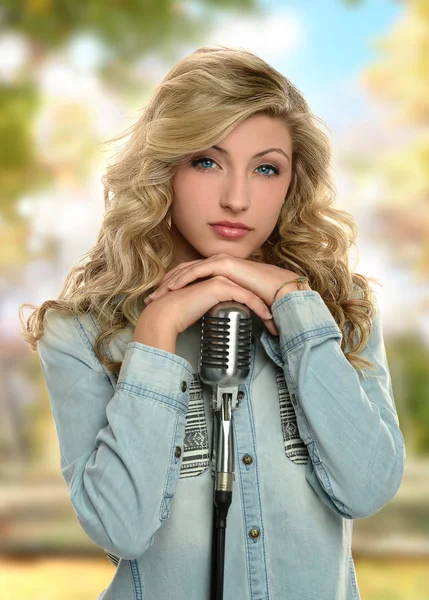 Young Girl Singer with microphone — Stock Photo, Image