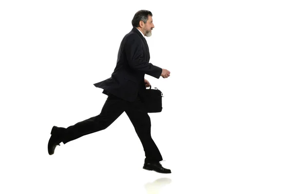 Empresário caminhando com pressa — Fotografia de Stock