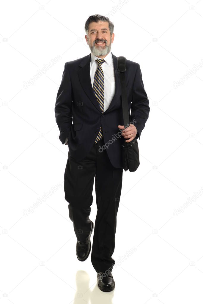 Mature businessman walking
