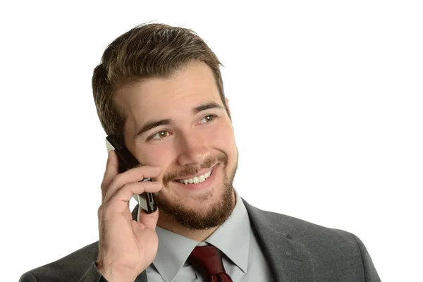 Młody biznesmen na telefon komórkowy — Zdjęcie stockowe