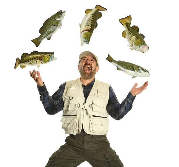 Fisherman juggling with fish — Stock Photo, Image