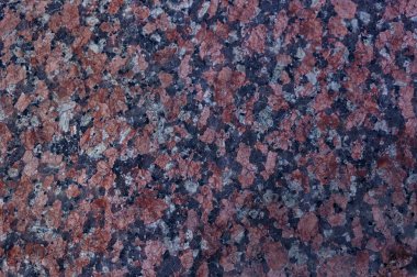 Mermer doku ile kırmızı, siyah ve beyaz parçacıklar