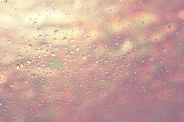 Drops Glass Glass Multicolored Blurred Lights — Stock Photo, Image