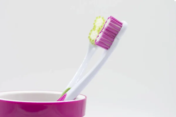 Toothbrush White Background Different Colors Pink Green Vertical Horizontal Photographs — Stock Photo, Image