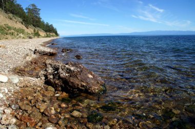 Baykal Gölü dünyanın en derin gölüdür. Bu sadece derin, ama aynı zamanda en güzel güneşli havalarda özellikle var. Bu fotoğraflar harika baykal izinde Bolshie Koty köyü yakınındaki yapılır. Birçok güzel tür onu