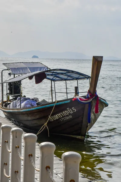 Travel Boat On Thailand Island Beach. rocks Tropical Coast Asia