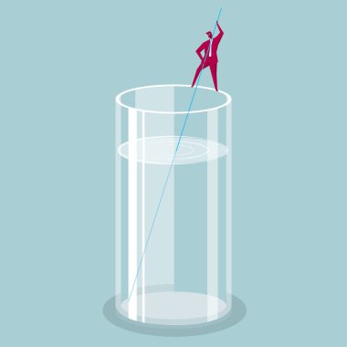 Bir işadamı cam kenarında duruyor. İçki karıştırın.