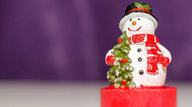 noel dekorasyon bir kardan adam şeklinde mum 