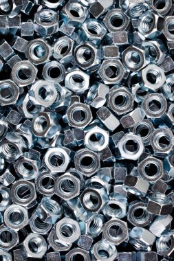 Altıgen metal fındık. Dokulu arka plan görüntüsü.