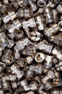 Pex boru bağlantı parçaları. Dokulu arka plan görüntüsü.